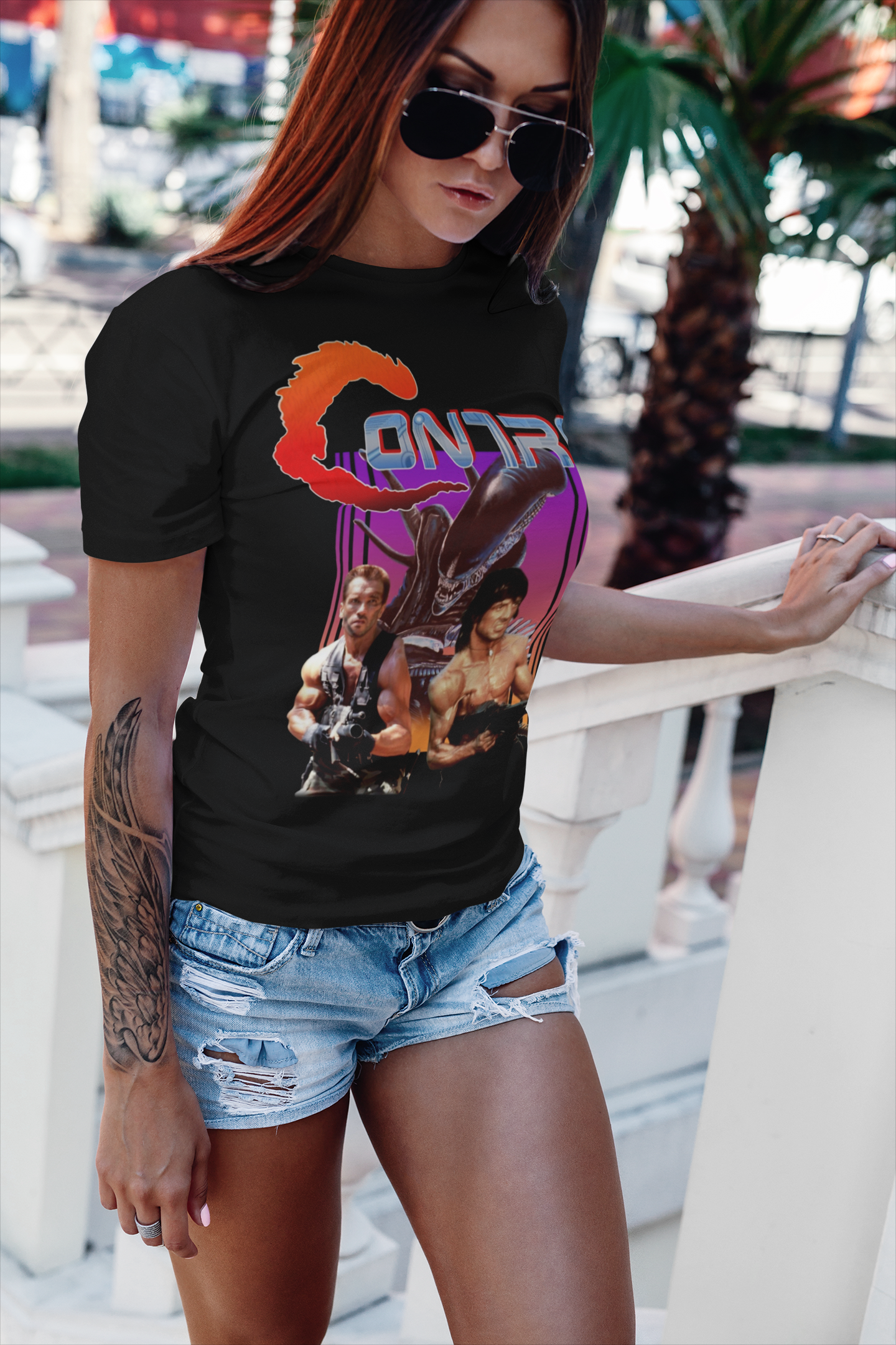 Contra NES Graphic T-Shirt | Arnold Schwarzenegger Sylvester Stallone Retro Gaming Tee | RetroPunkDesign - Retro Punk Design 